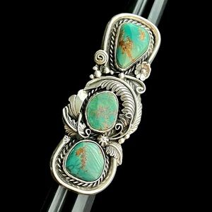 Vintage signed Navajo Cow Spring turquoise and sterling silver ring